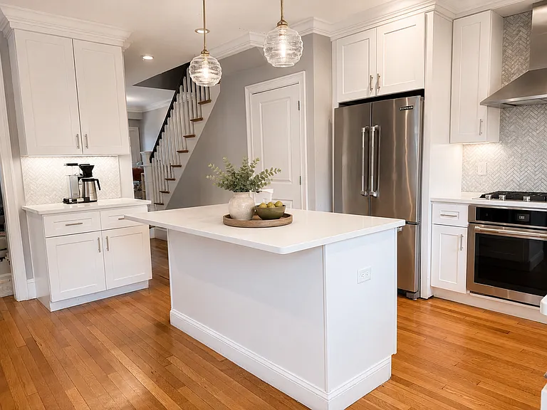 Thoughtfully designed kitchen layout with great flow, generous prep space and under cabinet lighting.