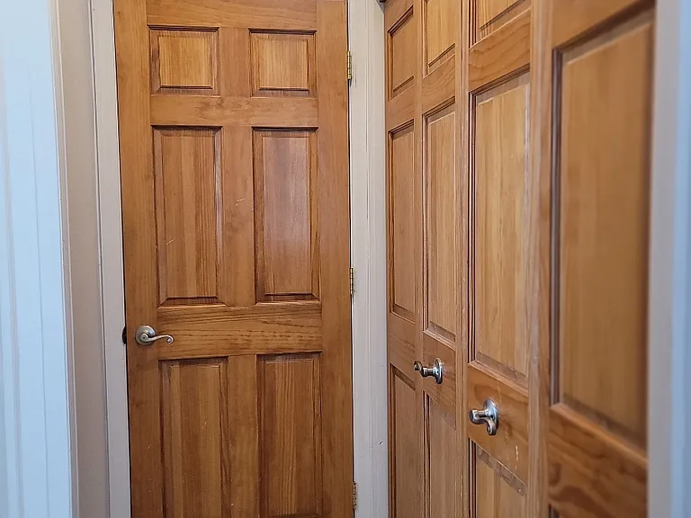 Half bath is straight ahead, laundry closet to the right, and master bedroom to the left