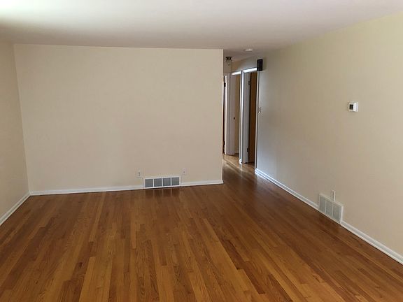 Living room looking towards bedrooms. Size approx 13'3" x 19'6".