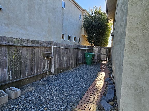 Right side of the yard with gate