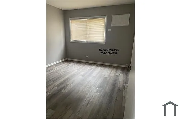 Building Photo - 7812 S Troy St #13