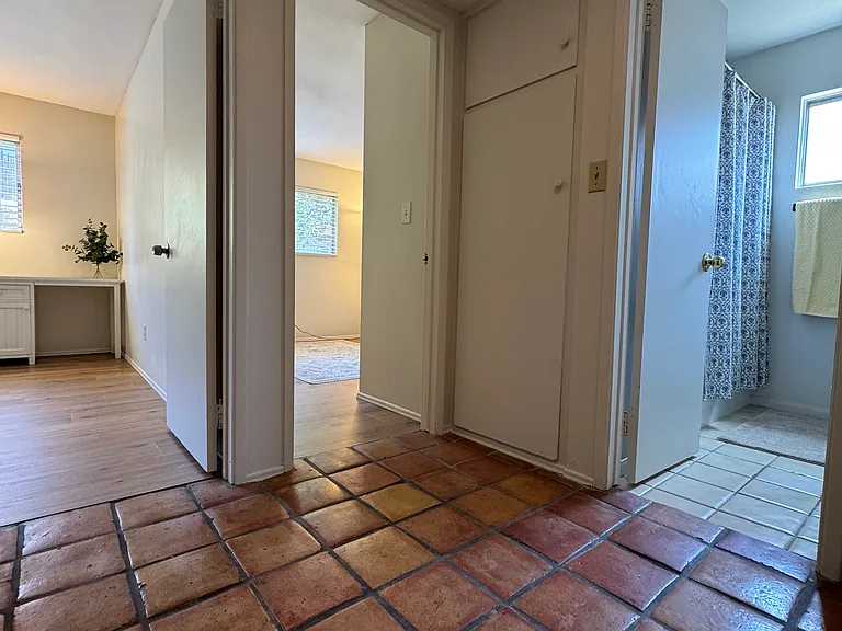 Hallway view: Bedroom #2 on left, Office in the middle and private full bathroom on the right.