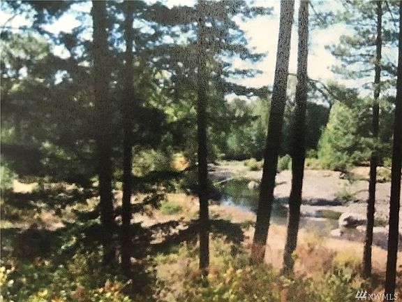 Path to the river down the hill. Once you are on way down go to left may need more clearing done. Potential to  do switch back trails so can get a jeep down or side by side.  Level once your down along the river.