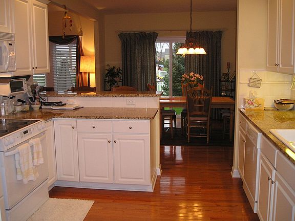 Granite and Hardwood floors in the kitchen