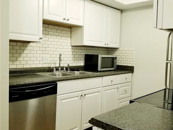 Great galley style kitchen with plenty of cabnets