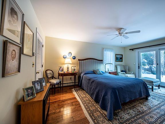 First floor bedoom with doors to outside