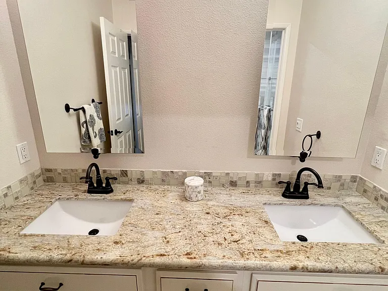 Secondary upstairs bathroom (outside of other three bedrooms)