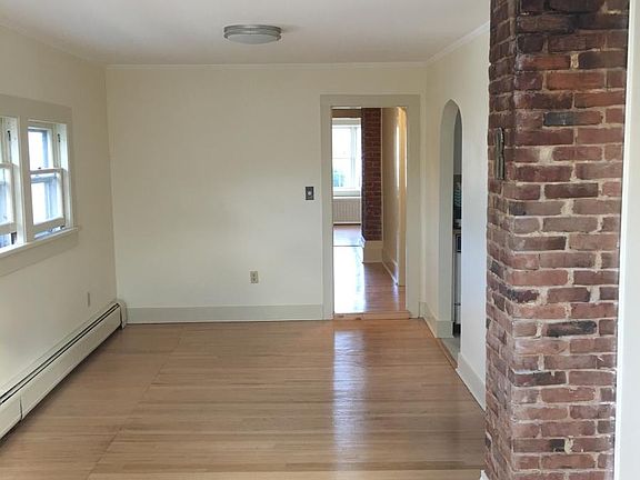 Beautiful light and vintage accents in this living and dinni