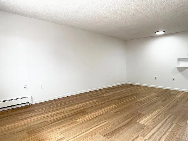 Building Photo - 3300 S Clarkson St #203
