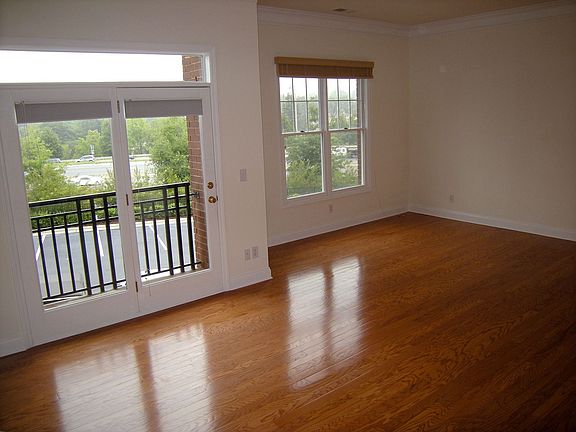 Shining wood floors in the open living area.