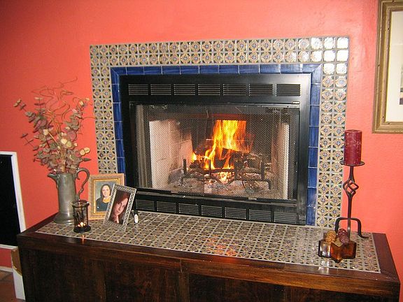 Family room fireplace w/custom Mexican tiles