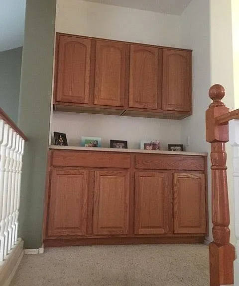 Loft with storage cabinet