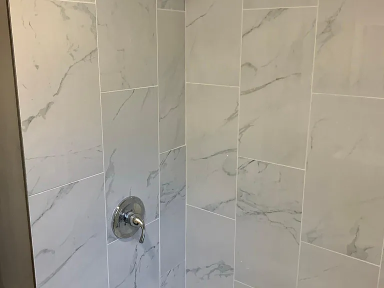 Newly tiled shower and tub.