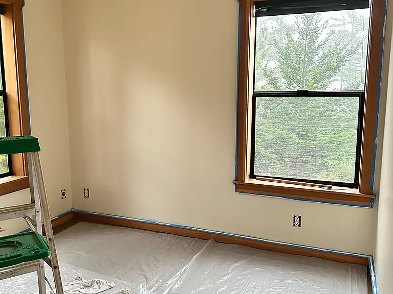Smallest bedroom, all bedrooms have carpeting and large windows.