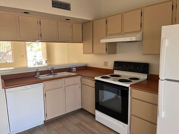 Kitchen is large enough to accommodate table and chairs