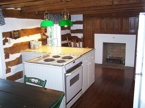 Exposed logs in Kitchen