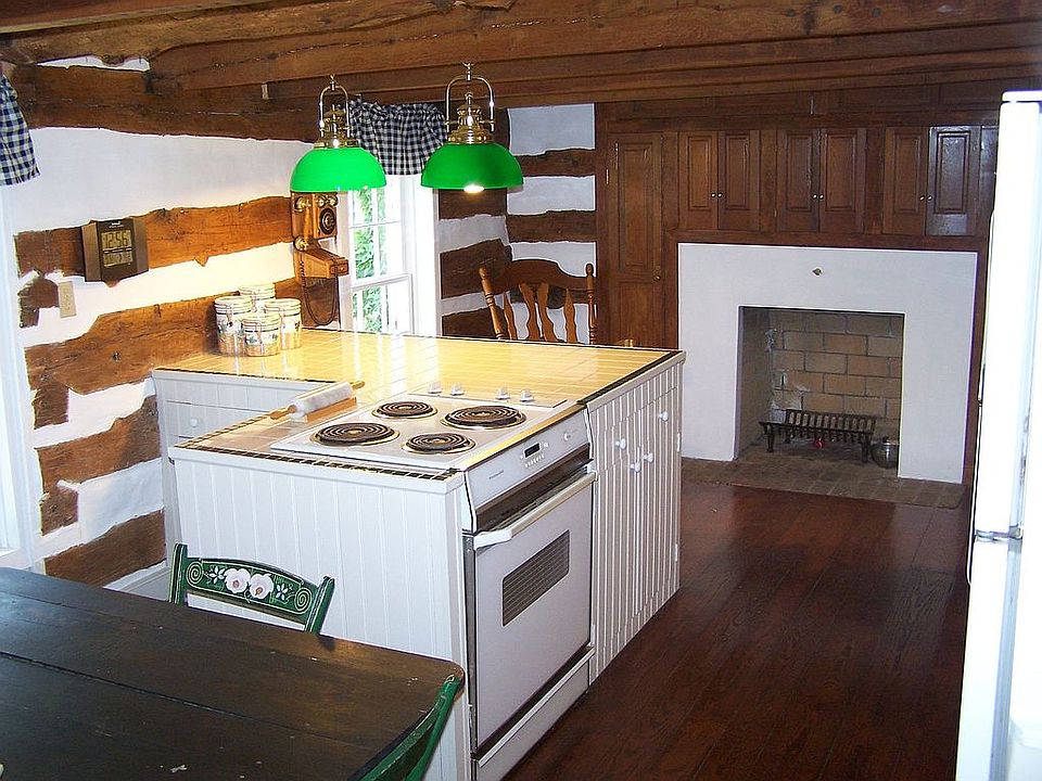 Exposed logs in Kitchen