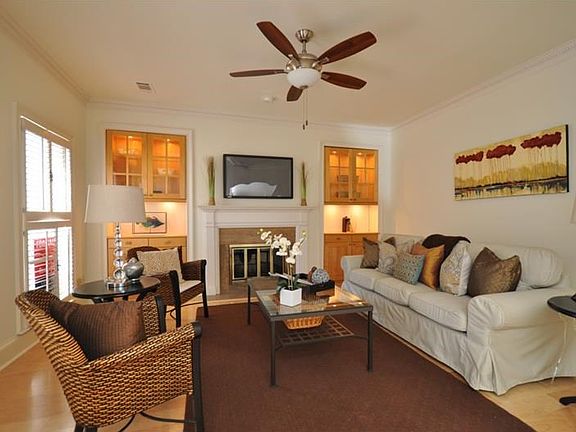 Great light, built-in cabinets with lighting, fireplace and a well-sized living room make this home perfect for all your gatherings, be they small and intimate or large and full of life!