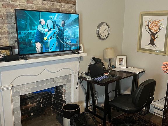 living room with non working fireplace