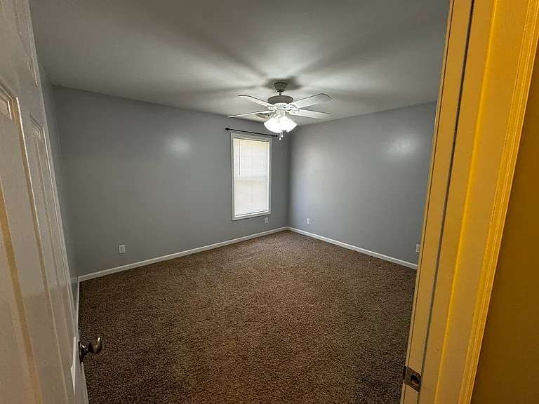 Inside view of master bedroom taken from the hall.