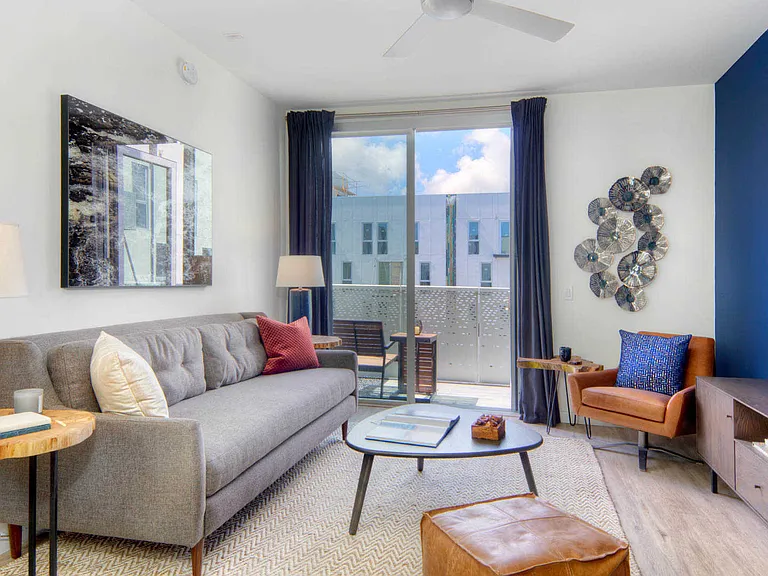 Living Room with Hard Surface Flooring and Balcony