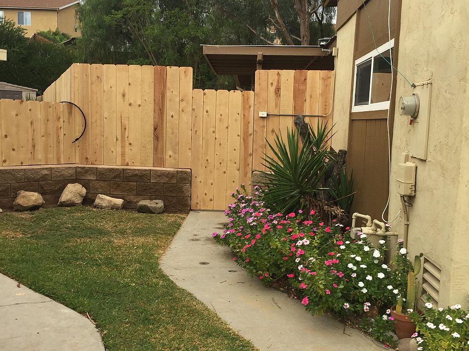 Enter through the garage or your private gate, which leads you to your own private yard and front door. 
Enjoy peace of mind with a locking gate from the inside, ensuring total privacy.