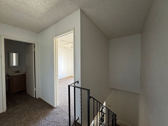Upstairs has the full bath, 2 bedrooms, and a closet that could be used for linens or storage.