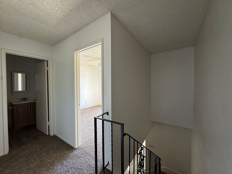 Upstairs has the full bath, 2 bedrooms, and a closet that could be used for linens or storage.