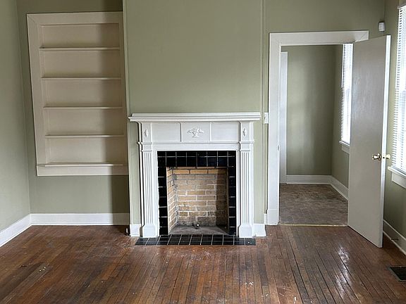 Family room with faux fireplace