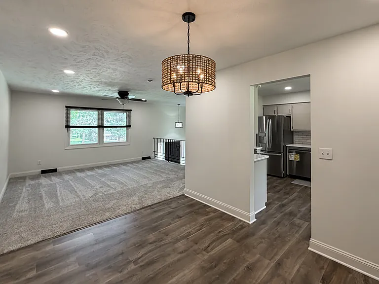 In the Dining Area Looking Into Living Area and Kitchen