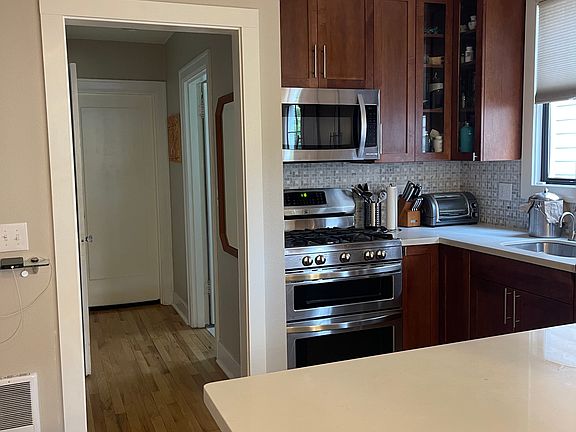Interior main. Kitchen with island to main living room.