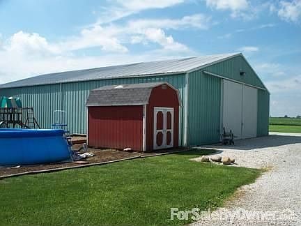 Part of the Backyard : Machine shed, small barn shed, kids play area