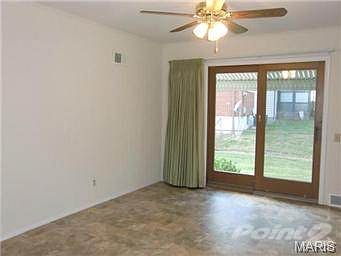 Dining/breakfast area located off the kitchen with updated slidi