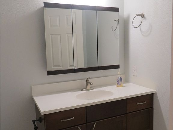 New vanity, mirror, fixtures