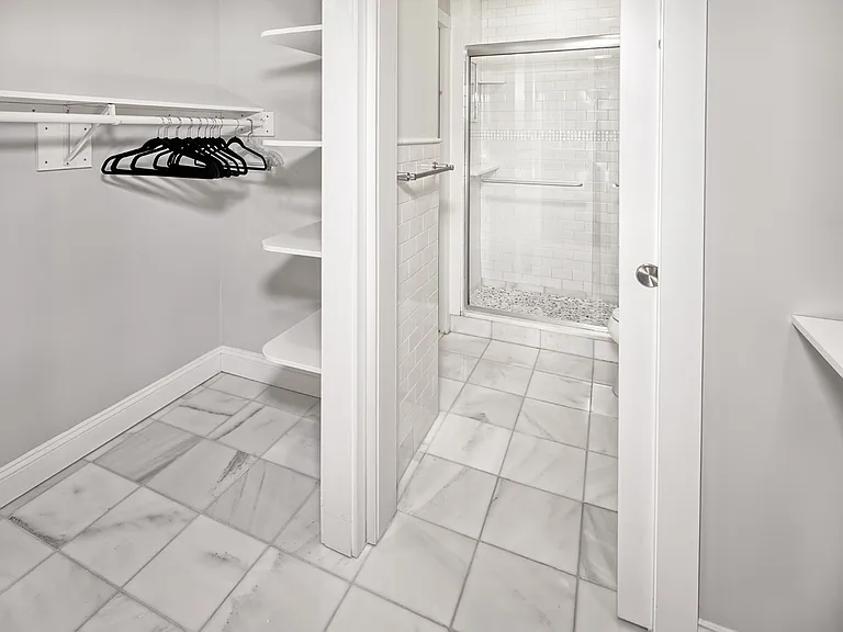 walk in closet Marble full bathroom