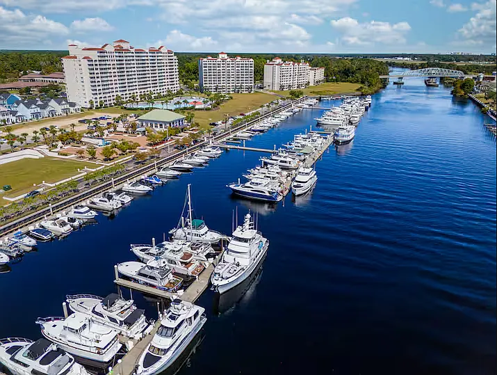 The North Tower Pool is located next to the Intracoastal Waterway at the front of the resort. Do you see the historic swing bridge in the distance?