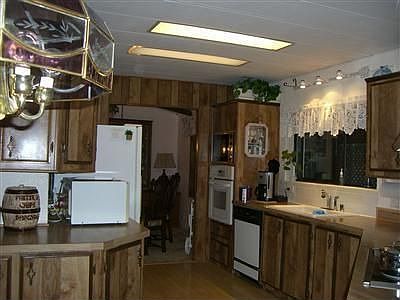 Huge kitchen with solar tube, tons of counter and cupboard space.