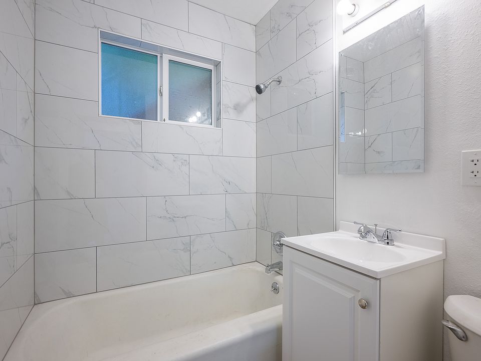 Beautifully remodeled bathroom, large stone tile shower and bathtub!