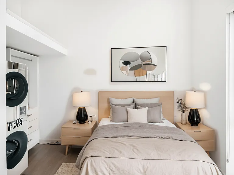 Relax in the spacious bedroom with a large bed and modern decor at Alt Capitol Hill.