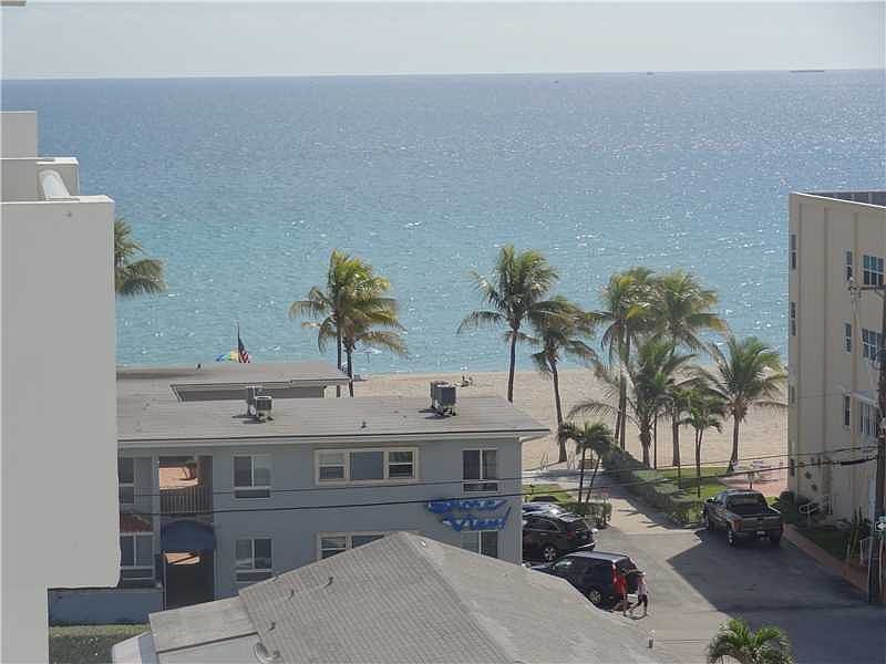 PANORAMIC WATER VIEWS FROM THIS 2BED/2BATH CORNER UNIT STEPS FROM THE BEACH