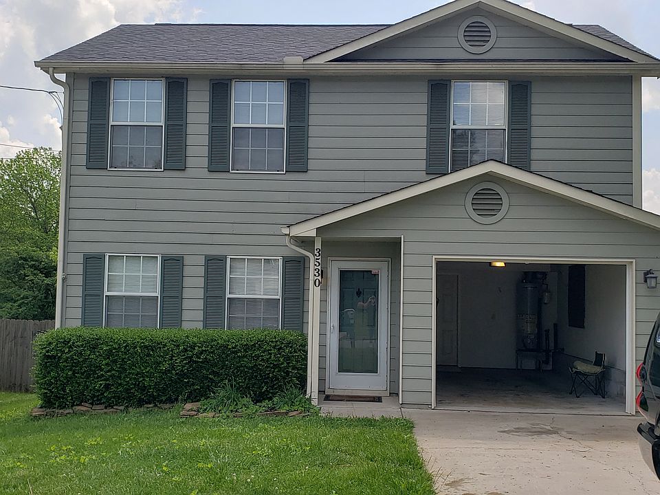 Front of house, extra vehicle parking off side of driveway.