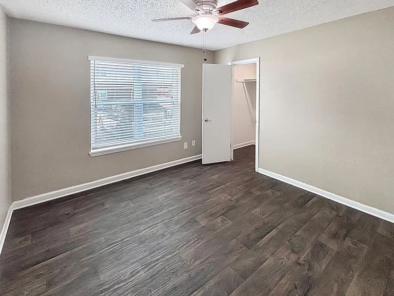 Comfortable bedrooms feature ceiling fans and natural light for everyday relaxation.