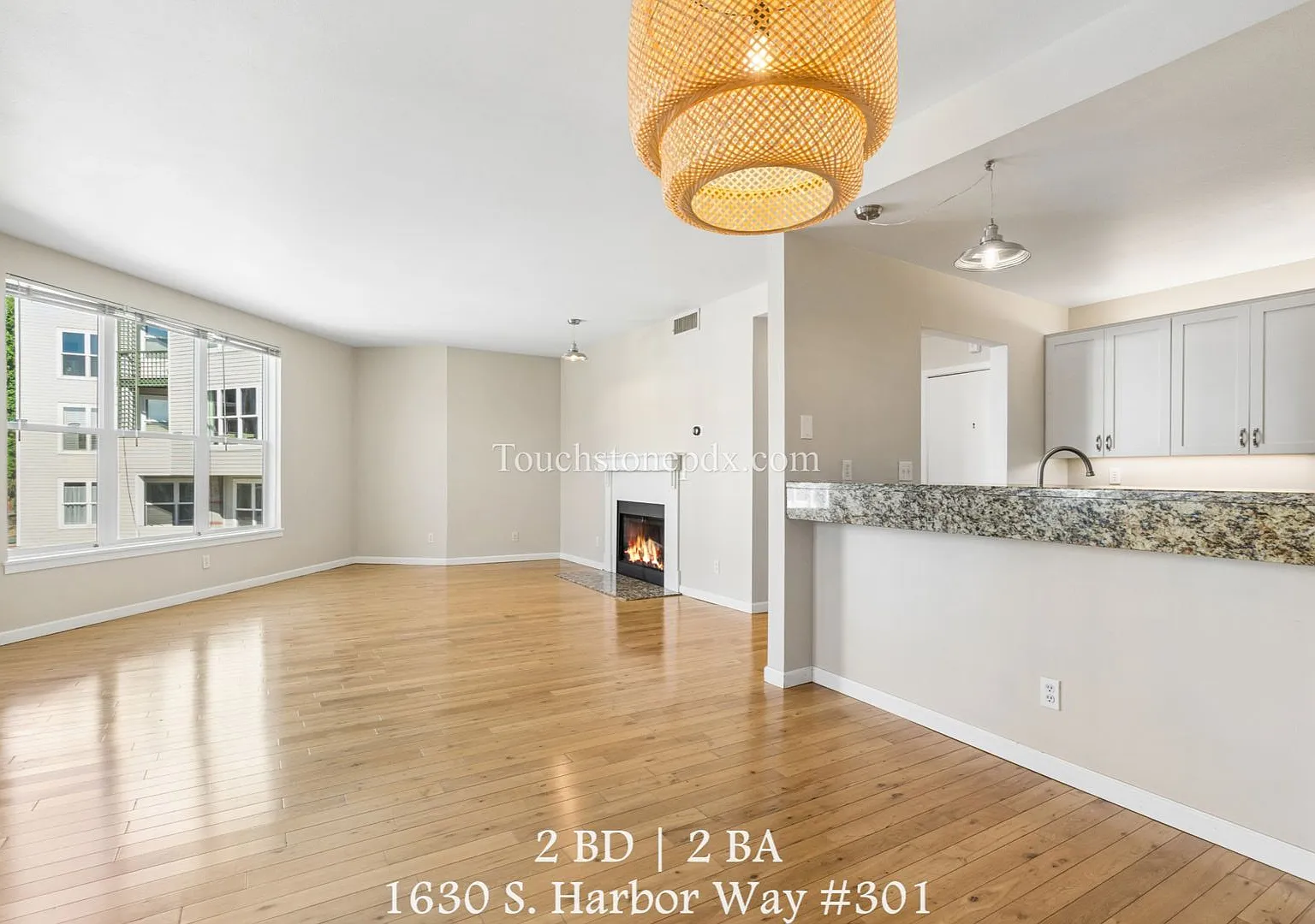 Beautifully Maintained Condo on South Waterfront — Photo 1