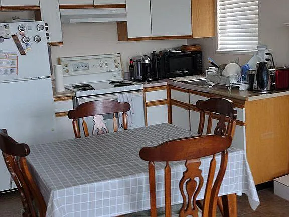 Dining and kitchen area.