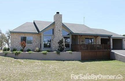Custom built in 2004
						:
						Exterior is Natural Stone and Hardy Plank . Fascia is all 2X8 cedar