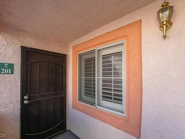 7570 W Flamingo Rd #201 — Photo 1