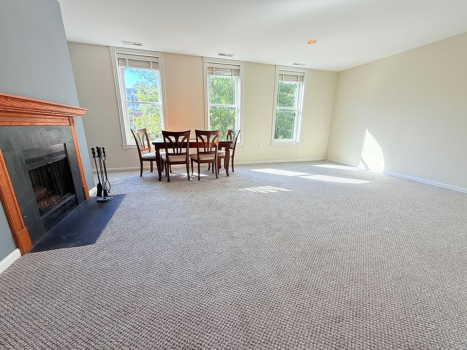 Living Room with working wood-burning fireplace