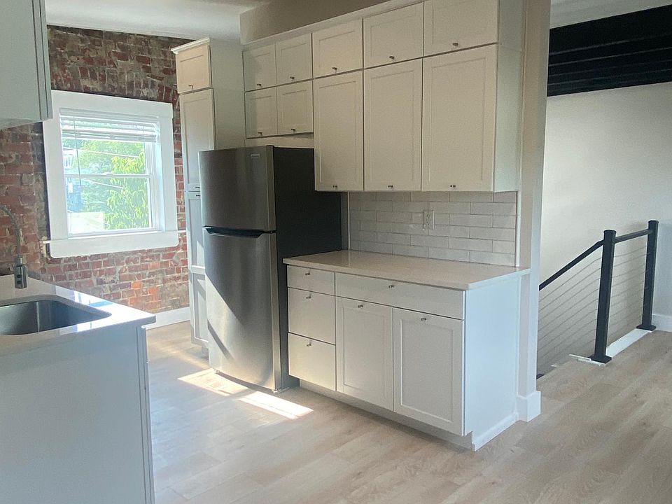 Looking into kitchen. Outside there are several options for where to put a dining room table. Very open and roomy feel