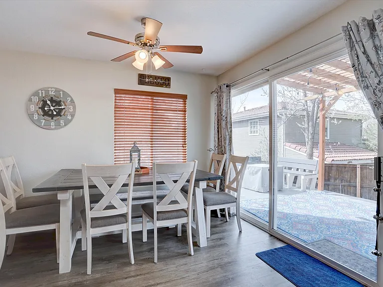dining area with sliding glass door to backyard