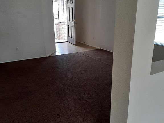 From dining area to living room to front door